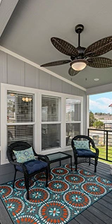 chairs on deck of tiny home