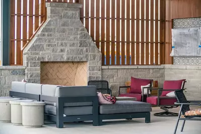 outdoor fireplace and lounge area at Firefly Resort in Fredericksburg TX
